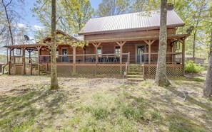 Enjoy sitting amongst the trees from our wrap-around porch.