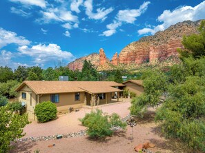 Exterior with amazing red rocks in the background. 