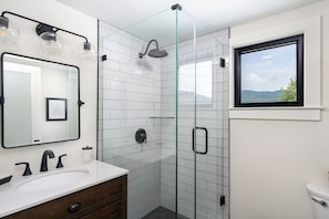 Modern and sleek bathroom with walk-in shower.