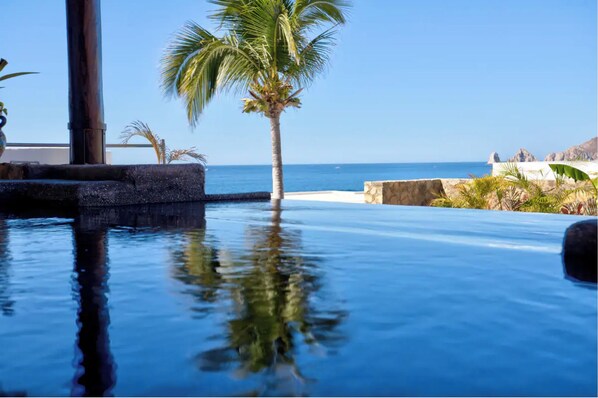The infinity pool overlooking the ocean
