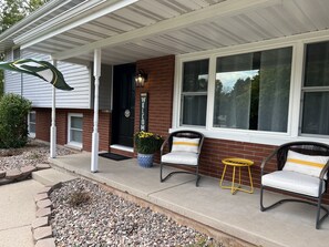 Enjoy a cup of coffee or a different libation from the front porch.