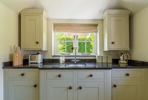 Ground floor: Luxury fully fitted kitchen with Indian limestone and underfloor heating