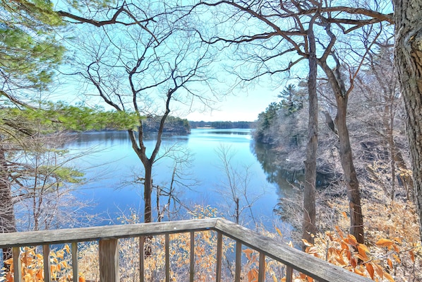 The home overlooks Lake Cochituate in a private setting surrounded by woods!!