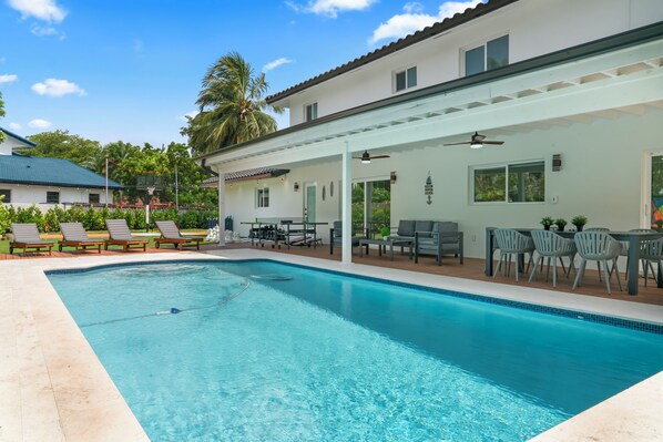 Sundrenched Serenity: Lounging by the Poolside Haven