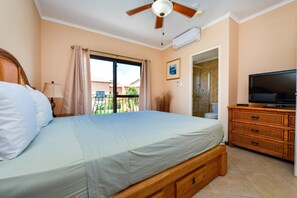This bedroom features a queen sized bed. It's spacious that will allow you to enjoy your own space while on vacation.