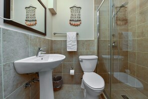 Ensuite bathroom with spacious shower.