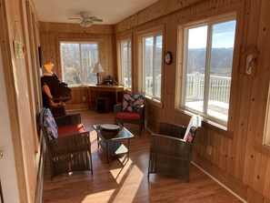 While sipping your coffee enjoy the views from the sun porch.