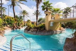 Drift your cares away in the resort’s relaxing lazy river—an oasis just steps from your door. Whether you're floating under the sun or enjoying a peaceful moment with the family, this is the perfect way to unwind after a fun-filled day at Disney.