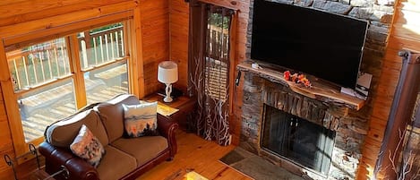 Main living room with two story fireplace