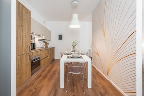 Dining area with fully equipped kitchen