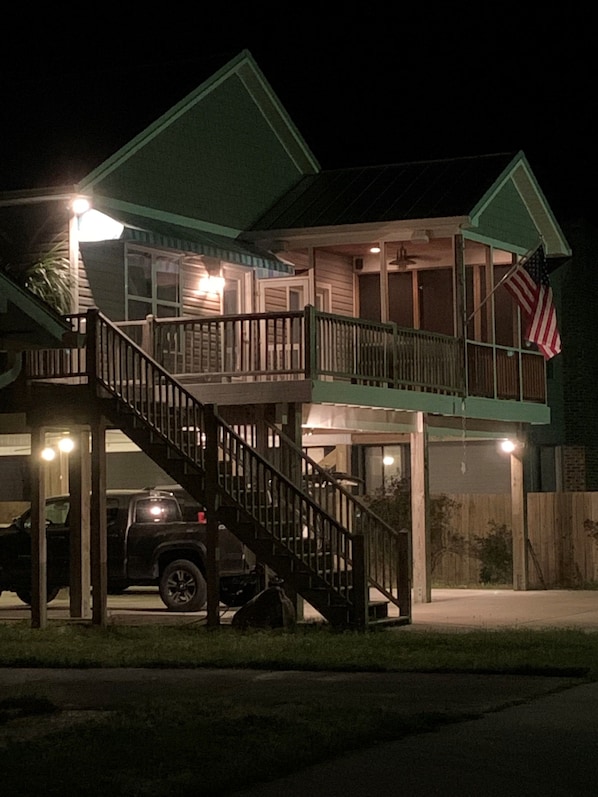 Front of house at night