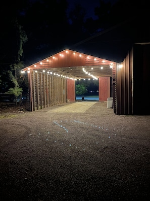 Corn crib entry is one of two entries.  Alluminated in the evening !