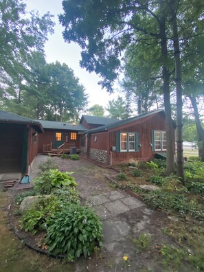 Side yard, back of house.