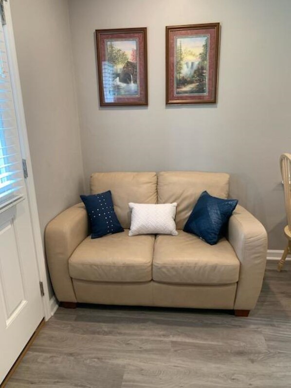 Sitting area in living room with smart TV