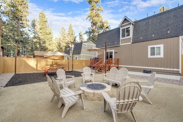 Create memorable moments by the gas firepit, the perfect spot for cozy gatherings.