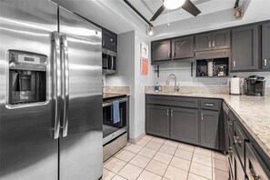 Become a chef in our newly renovated kitchen with stainless-steel appliances!