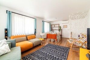 Our living room includes a confortable 2 seater and 3 seater sofa