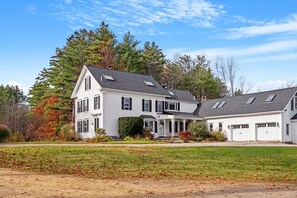 Side exterior of house with garage