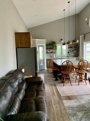 Living room and kitchen face south and have a beautiful view 
