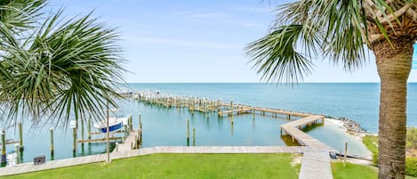 Experience Peaceful Mornings Overlooking Mobile Bay. This Breathtaking View Can Be Enjoyed from The Living Room Balcony.