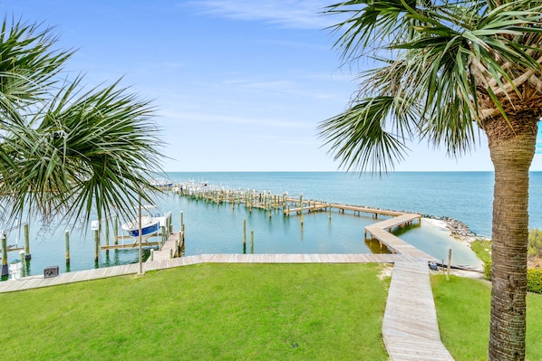 Experience Peaceful Mornings Overlooking Mobile Bay. This Breathtaking View Can Be Enjoyed from The Living Room Balcony.