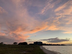 View of an Amazing Sunset With our Building In The Background! Taken From The Bay Side Beach.