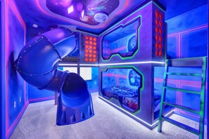 Bedroom 5 (Upstairs) - Exciting Star Wars themed Bunkbed bedroom with fun slide feature, flat screen TV and an Attached Shared bathroom