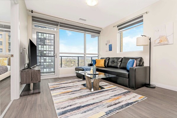 Bright living room with direct balcony access