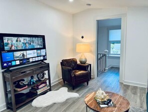 Comfortable Living Room with 50" Smart TV.