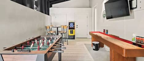 Dedicated game room - Smart TV, shuffleboard, foosball, PacMan and pub table