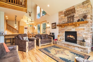 Spacious living room with gas fireplace.