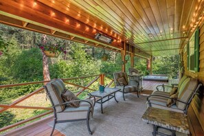 Back deck has a BBQ and lounging area with a heater.  It's a peaceful space to have your morning coffee or gather for happy hour and listen the the creek nearby.