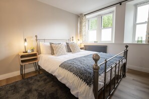 Number Three, West Witton: Master bedroom overlooking the outside seating area