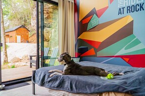 The Naturalist features huge glass windows in the main-floor bedroom - making the perfect view when you wake up. Plus we are pet friendly!
