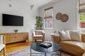 Spacious living room with seating for your group 