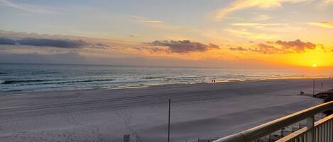 Balcony Sunset View - See all of our 5 star reviews on GSBeach.com