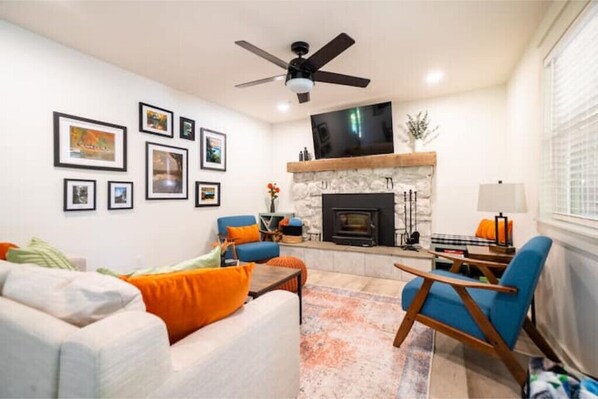 Living Room with wood-burning fireplace