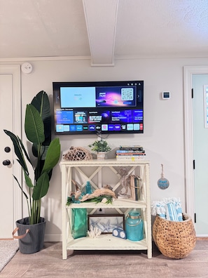 Smart TV with swivel mount allows for watching TV from the bed, sofa, or desk