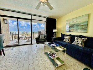 Living Room (sleeper sofa), dining table, balcony w/dining table, views water.
