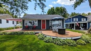 Vintage charm cottage with outdoor dining area and gas firepit.