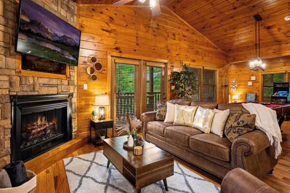 Imagine yourself relaxing on this plush couch in front of the fire!