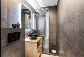 First modern bathroom with walk-in shower