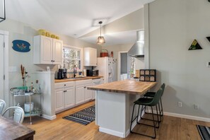 Efficiency meets style in this well-equipped kitchen.