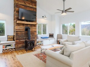 Step into comfort and style in this contemporary farmhouse living room.