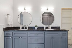 Double the convenience: Master bathroom features a Jack and Jill vanity.