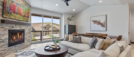 Black Rock Ridge 14488: Living Room: "Cozy space with a sofa set, fireplace, and stunning views."