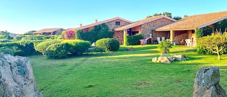 Garden view from parking area and from the nearest beach road