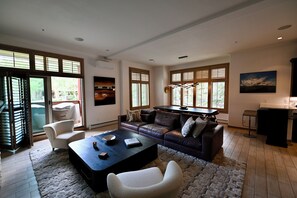Living and dining rooms. Balcony for breakfast or cocktails.
