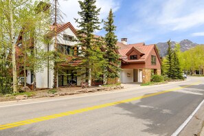 The condo building with temporary unloading driveway.