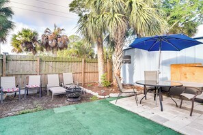 Backyard | Shaded Outdoor Dining Table | Gas Grill | Lounge Chairs